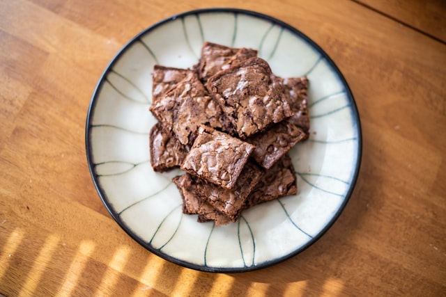  A stack of brownies on a plate