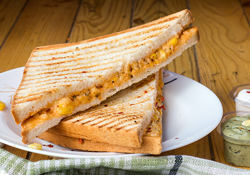 Classic Kiwi cheese toastie with creamed corn filling.