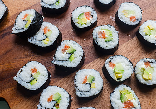 Sushi on a brown board